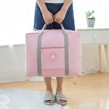 Дорожная однотонная маленькая Свежая сумка для тяги с круглой этикеткой, складная дорожная сумка для хранения, Переносная сумка для сортировки одежды Изображение